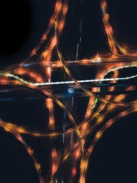 Light trails on road in city at night
