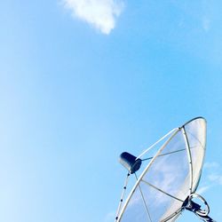 Low angle view of satellite dish against blue sky