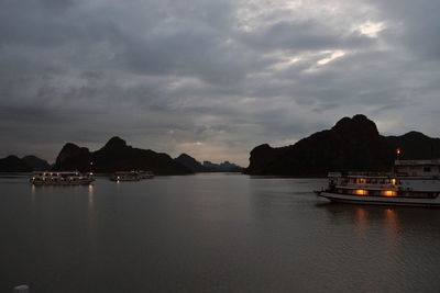 Scenic view of sea against sky at dusk