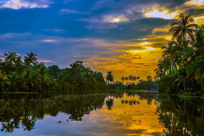 Scenic view of lake against sky during sunset