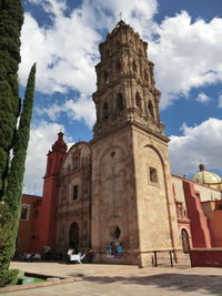 Low angle view of historical building against sky