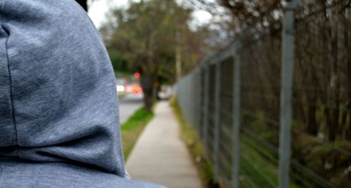 Blurred motion of person walking on road