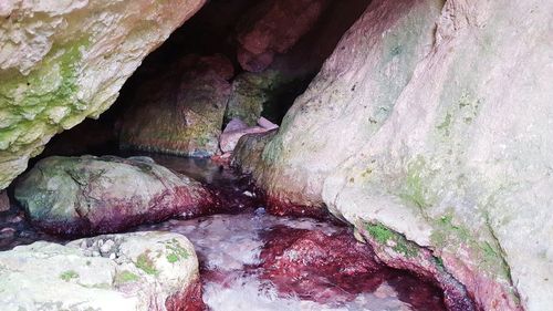 Close-up of rock formation in water