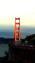 View of suspension bridge at sunset