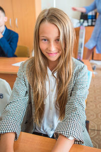 Portrait of smiling girl in classroom