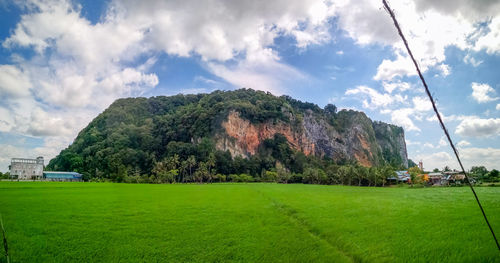 Scenic view of land against sky