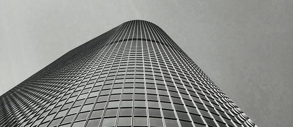 Directly below shot of modern building against sky