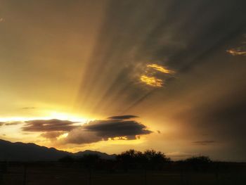 Scenic view of landscape at sunset