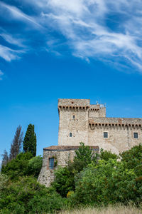 Low angle view of fort against blue sky