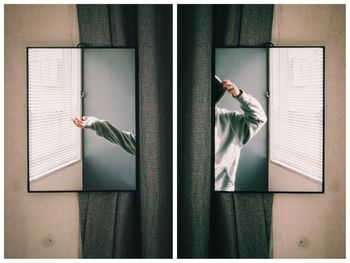 Low section of woman standing by window at home