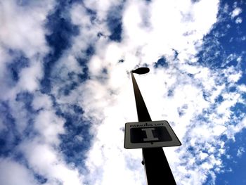 Low angle view of street light against sky