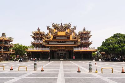 Exterior of temple against clear sky