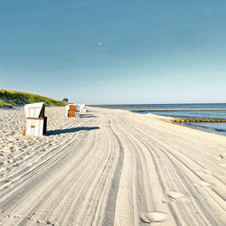 Deserted beach with beach chairs on the baltic sea