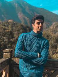 Young man looking away outdoors