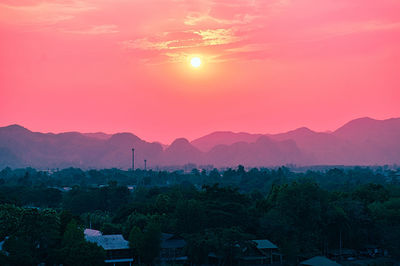 Scenic view of mountains against sky during sunset