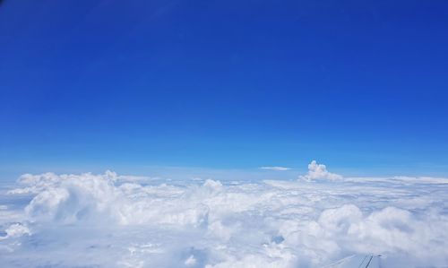 Aerial view of cloudscape against blue sky