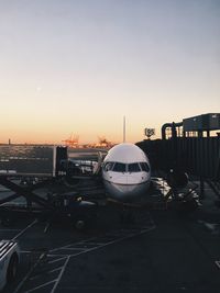 View of airport runway at sunset