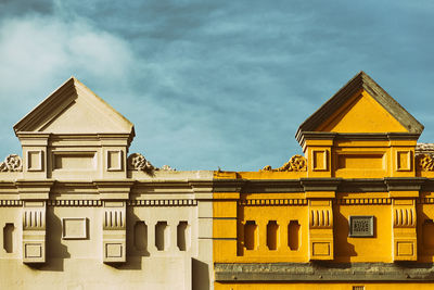 Low angle view of old building against sky