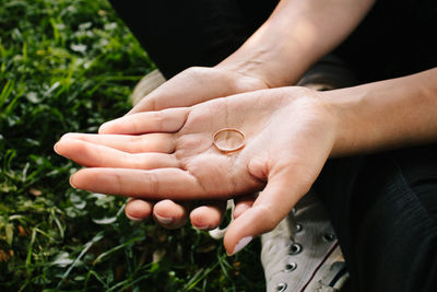 Close-up of hand holding hands