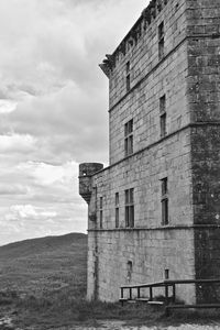 Low angle view of old building against sky