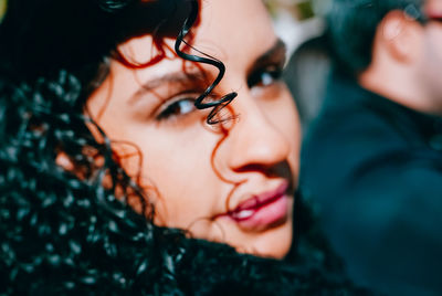 Portrait of woman with curly hair