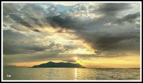 Scenic view of sea at sunset