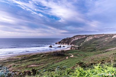 Scenic view of beach against sky