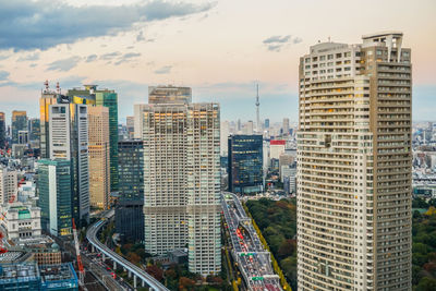 High angle view of buildings in city against sky