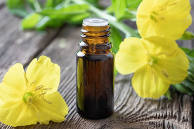 Close-up of yellow flower on table