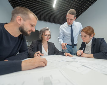 Business colleagues working at office