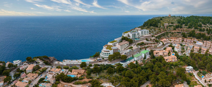 Aerial view of the luxury cliff house hotel on top of the cliff on the island of mallorca.