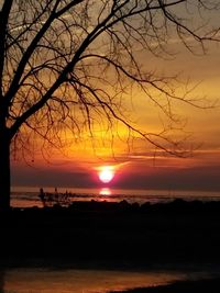 Scenic view of sea against sky at sunset