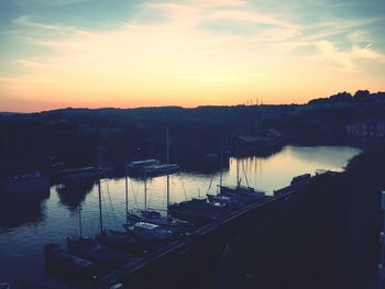 High angle view of boats moored at harbor