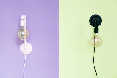 Close-up of light bulb hanging