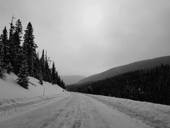Scenic view of snow covered mountain against sky