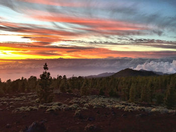 Scenic view of mountains at sunset