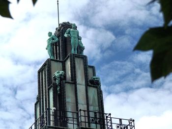 Low angle view of statue against sky