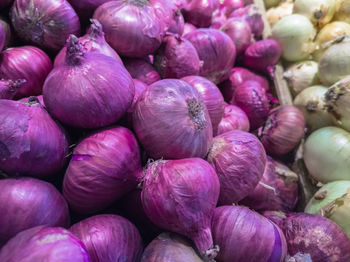 Full frame shot of onions for sale at market stall