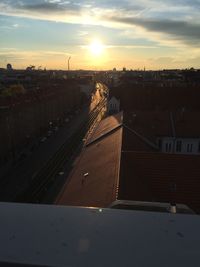 High angle view of cityscape against sky during sunset