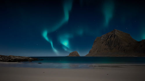 Northern lights on sky at lofoten islands, northern norway