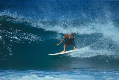 Man surfing in sea