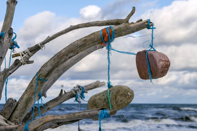 A composition of sticks and stones. installation on the seashore.