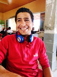 Portrait of smiling man at home