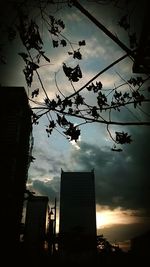 Low angle view of building against cloudy sky