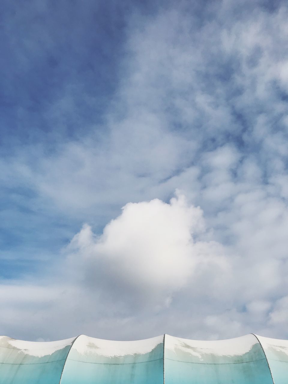 LOW ANGLE VIEW OF CLOUDS IN SKY OVER THE BACKGROUND