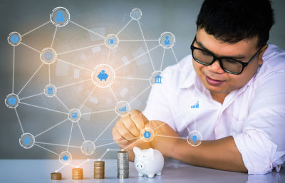 Full length of man using mobile phone