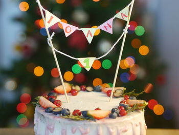 Close-up of cake served on table