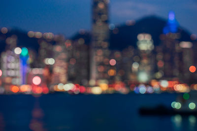 Defocused image of illuminated buildings at night