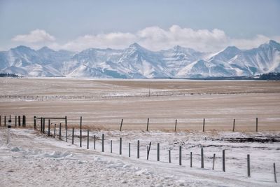 Scenic view of snowcapped mountains against sky