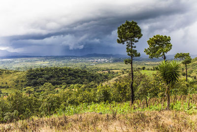 View of tropical storm in distance from a mountain in guatemala.